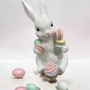 Cupcakes and cashmere White Bunny Figurine Holding Pastel Macarons and a cupcake